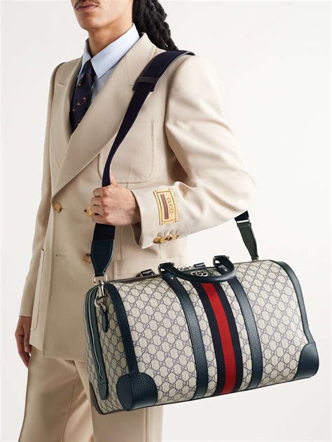 gucci duffle backpack.